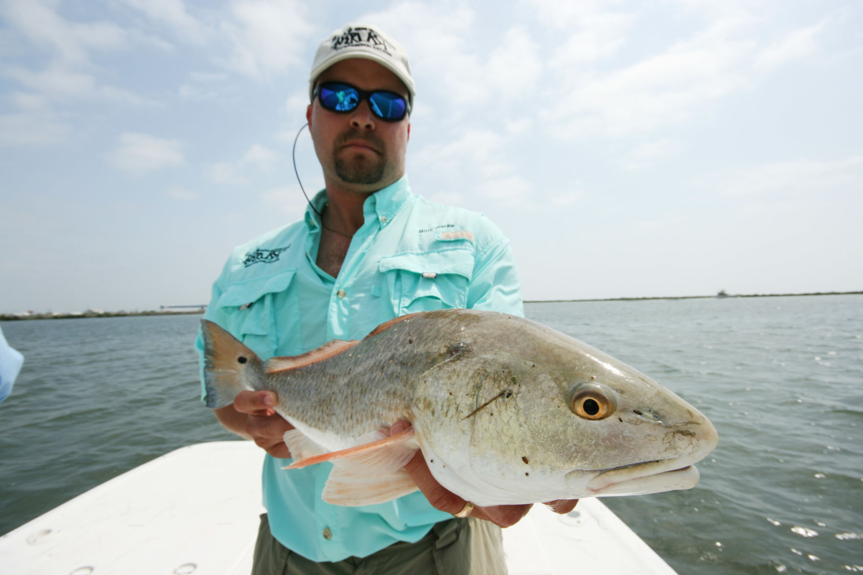 Rain is falling, and fish are biting